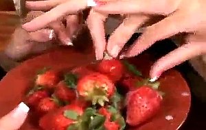 Ladies eat strawberries covered in boy toy cum