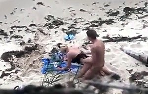 Pair spied fucking on the beach