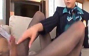Sexy japanese gives foot job on couch