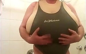 Blond shows off her big fake tits